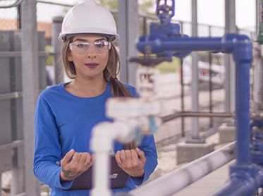 Female process technololgy student at Pilot Plant on West Campus.